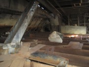 Gold saving tables. The nozzles at the upper left washed the rock from the gold. Photo by author. 